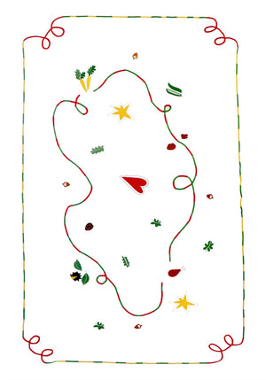 The white tablecloth has Christmas themed items embroidered on it: red heart, green leaves, green beans, carrots, chesnuts, chicken/turkey drumstick, a bright star and a red and green swirl covering the entire middle section.