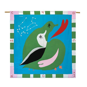 Flag design: teal blue back ground with two green ducks in the centre. A red heart is patched beside them. The border is pink, white and green.