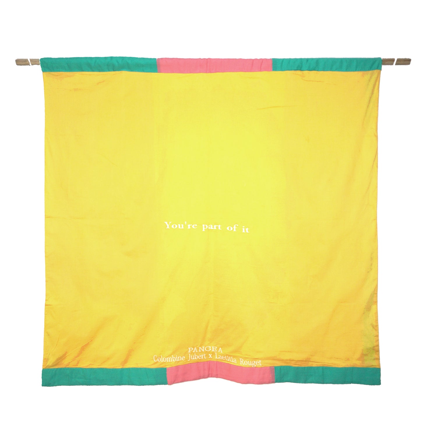 The back of the flag is yellow, and has the flag and creators names embroidered in white.